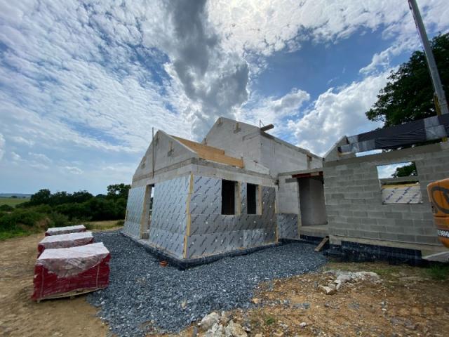 CONSTRUCTION D'UNE MAISON UNIFAMILIALE 