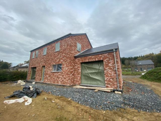 CONSTRUCTION D'UNE MAISON UNIFAMILIALE 